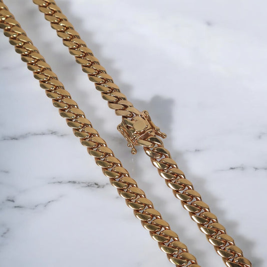 10K YG Cuban Links Chain / 133.8gr / 9.5mm / 22in /