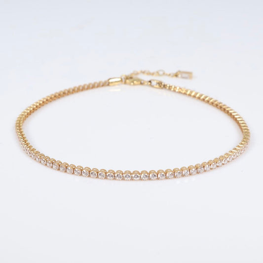 18K YG Tennis Bracelet / 4gr / 2mm / 9.5in Adjustable / White Zircons
