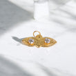 10K YG Saint Lucy Eyes Pendant / 0.29gr / 0.7in / White Zircons