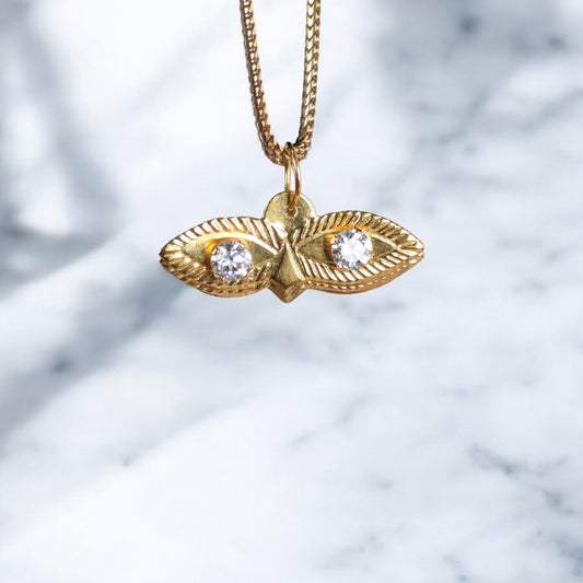 10K YG Saint Lucy Eyes Pendant / 0.29gr / 0.7in / White Zircons