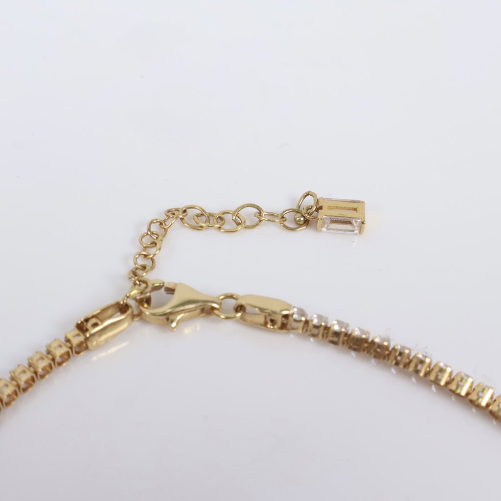 18K YG Tennis Bracelet / 4gr / 2mm / 9.5in Adjustable / White Zircons