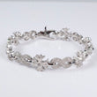 10K WG Diamond Infinity Flower Link Bracelet / 23.6gr / 8.6mm / 8in / 2.80Ct / VS2-SI / G-H