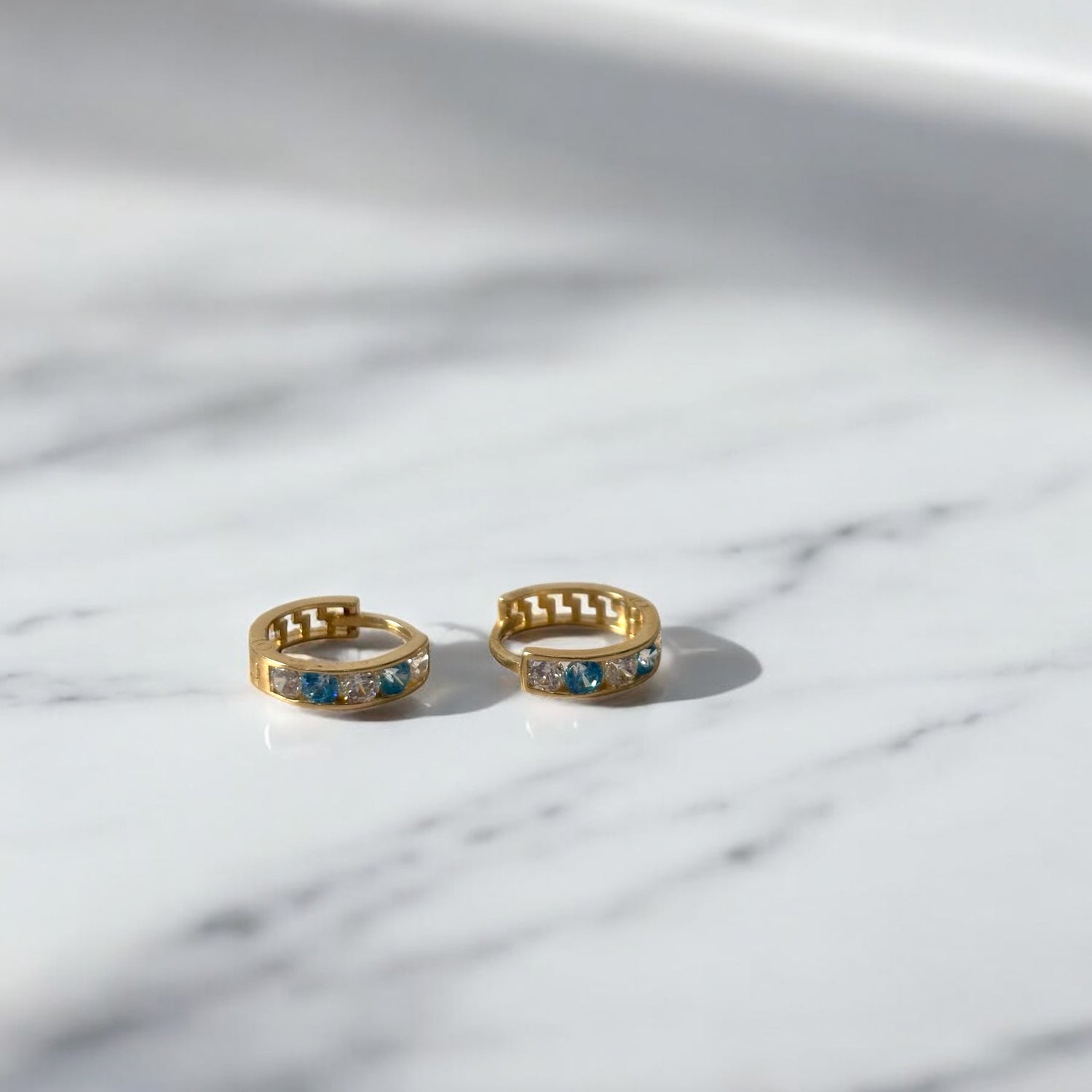 14K Yellow Gold Luxury Huggie Hoop Earrings With Sky Blue Zircons / 1gr