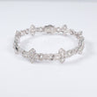 10K WG Diamond Cross-Infinite Bracelet / 16.7gr / 6.4mm / 8in / 4.35Ct / VS2-SI / G-H