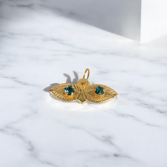 10K YG Saint Lucy Eyes Pendant / 0.29gr / 0.7in / Cyan Zircons