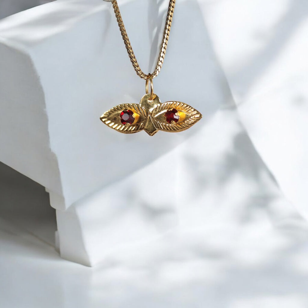 10K YG Saint Lucy Eyes Pendant / 0.29gr / 0.7in / Wine Zircons