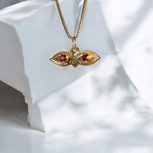 10K YG Saint Lucy Eyes Pendant / 0.29gr / 0.7in / Wine Zircons