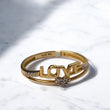 14K Yellow Gold Love Ring With Zirconia / 1.6gr / Size 7.5